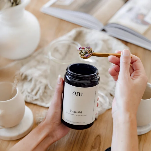 OM Peaceful Tea on a spoon